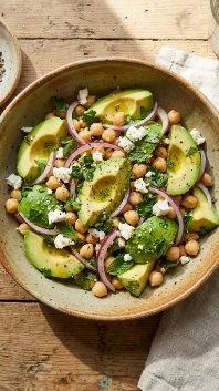 Chickpea Feta Avocado Salad 2 Chickpea Feta Avocado Salad with fresh ingredients in a bowl