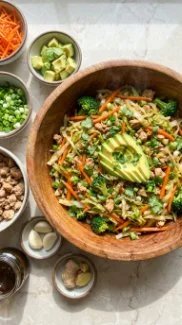 Colorful Egg Roll Salad in a bowl with fresh vegetables and sesame dressing
